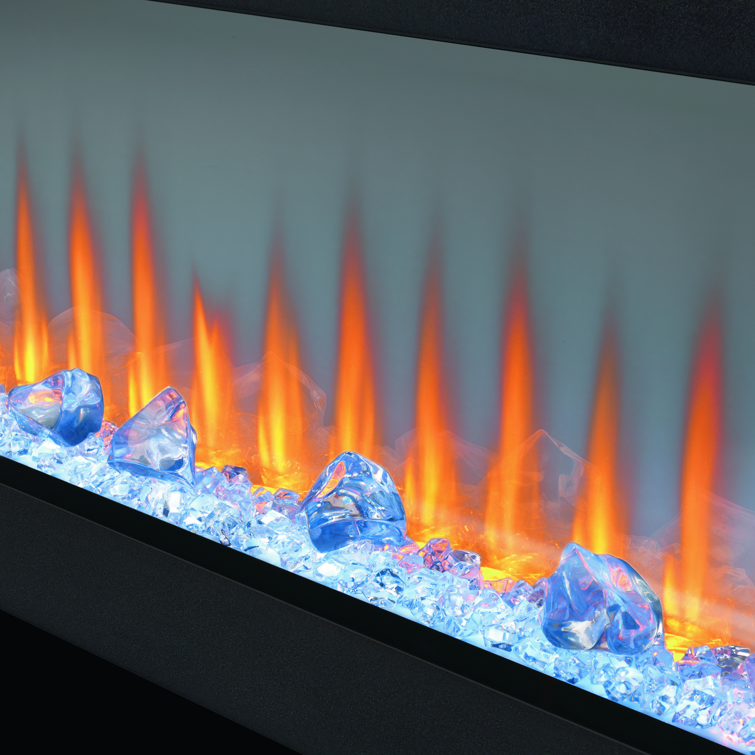 Artificial fireplace with blue flames and glowing embers on a gray background