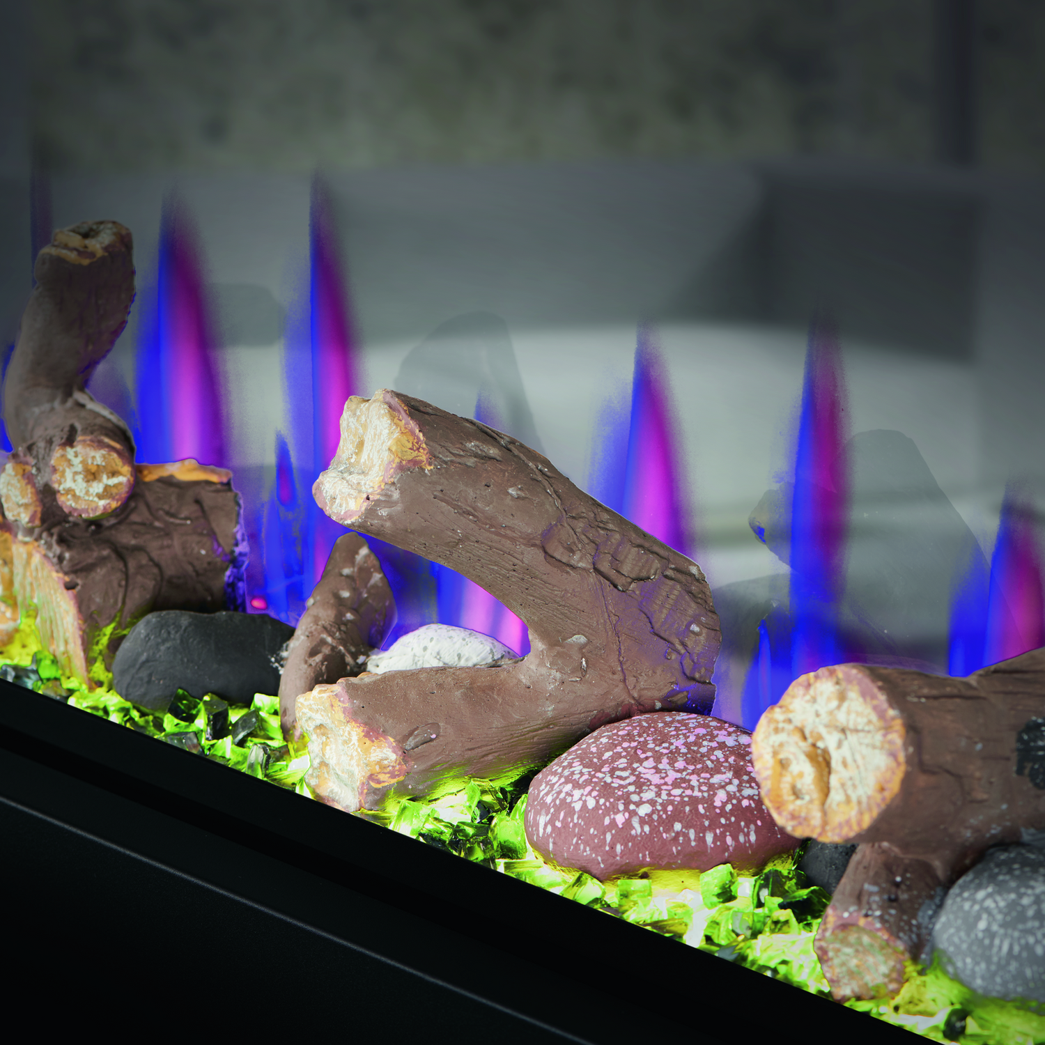 Decorative fireplace with colorful flames and rocky landscape