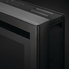 Close-up of a metallic object with a dark background