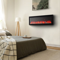 Bedroom with a wall-mounted electric fireplace and a bed with a blanket.