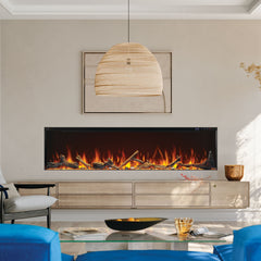 Modern living room with a large electric fireplace, blue sofas, and decorative elements.